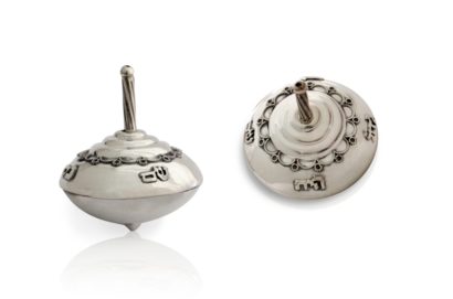 Rounded sterling silver dreidel with filigree decorations. Hannukah Judaica gifts made in Israel