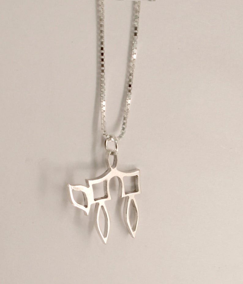 Sterling Silver Hollow Chai Pendant