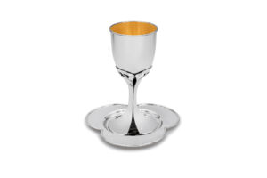 A modern Kiddush cup with the creator of the fruit of the vine