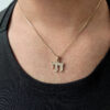 Lustrous 14K Gold Chai Pendant with Diamonds