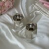 Pure Silver Tea Light Candlesticks in Contemporary Curled Design