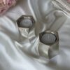 Pure Silver Tea Light Candlesticks in Contemporary Curled Design