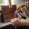 Opposing Handles Sterling Silver and Gold Brass Washing Cup